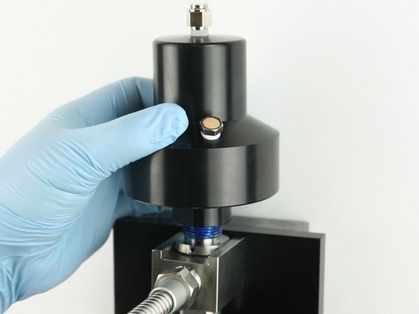 Thread (hand tighten) the actuator to the top of the valve body.