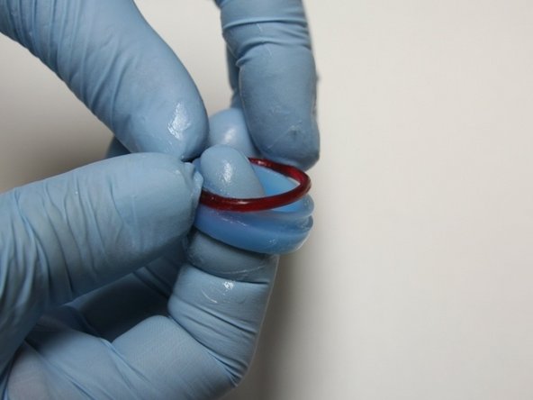 Put the O-ring onto the high-pressure seal.