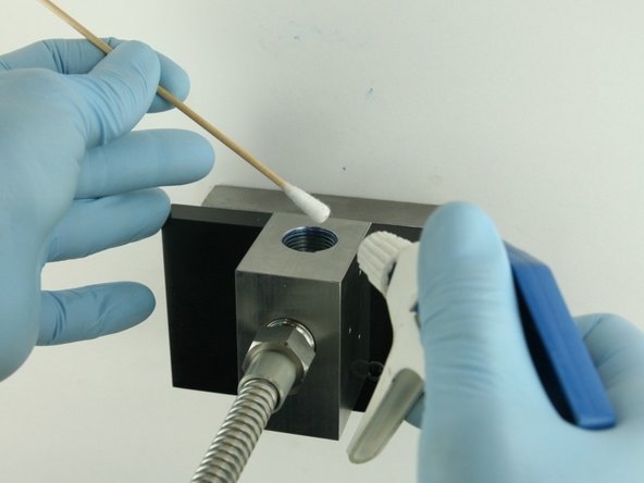 Thoroughly clean the interior of the valve body with isopropyl alcohol or a similar cleaning agent before replacing the components.