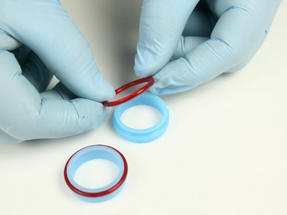 Put the O-rings onto the high-pressure seals.