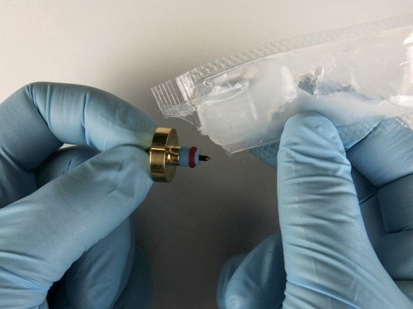 Apply a high-pressure lubricant to the outside diameter of the high-pressure valve seal.