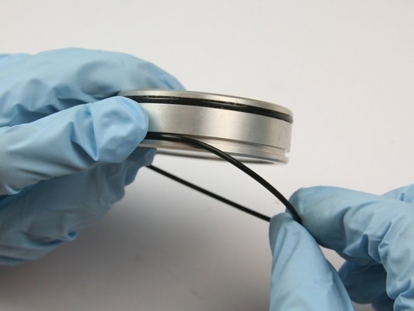 Put the other O-ring from the kit onto the second groove of the piston.