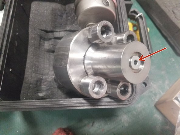 Ensure oil is full. Open the 3/16" hex screw located on the contact face to check/fill using ATF fluid
