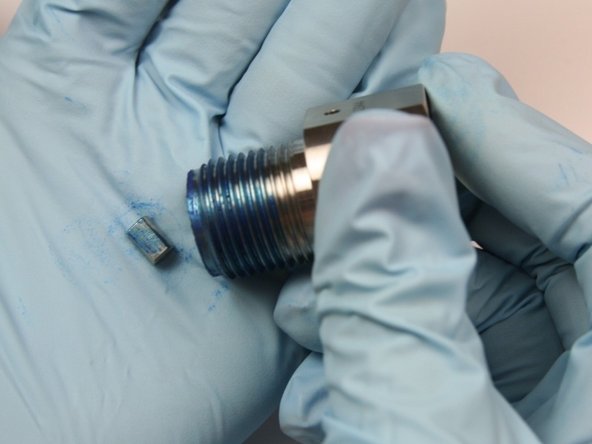 Remove Flow Reducer from bleed down valve adapter