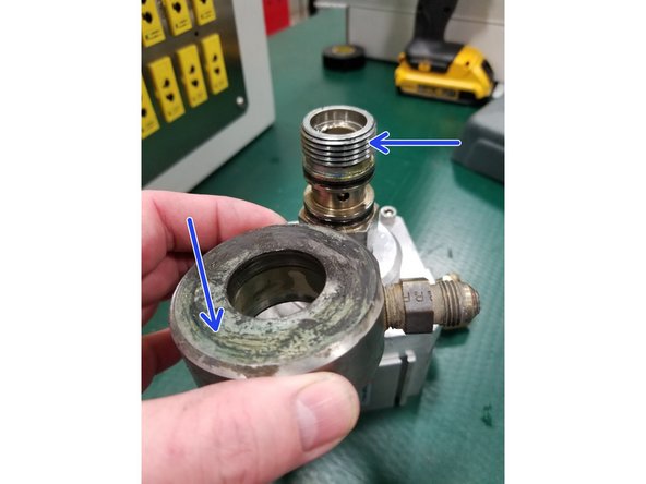 Apply blue lubricant to threads and both faces of the PCV adapter