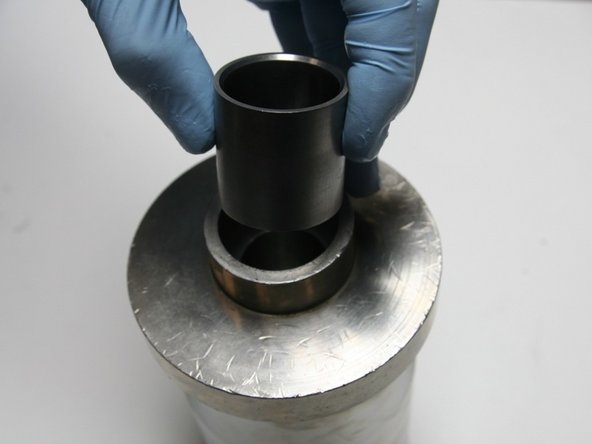 The sleeve guide should spin on the high-pressure cylinder when installed correctly.