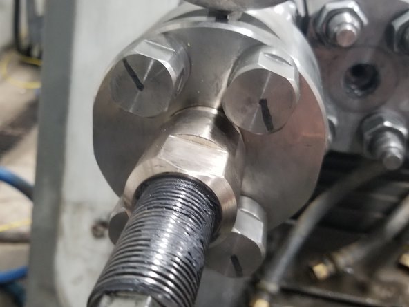 Once snug, back out the tool studs 1/4 turn. Place a radial line with a permanent marker to make this easier to see