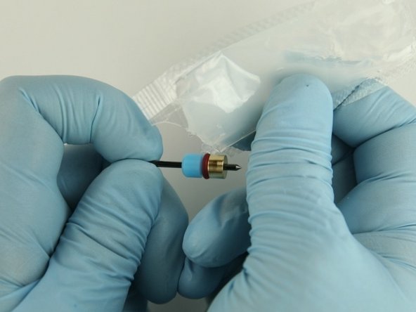 Apply a high-pressure lubricant or similar (11136) to the outside diameter of the high-pressure valve seal.