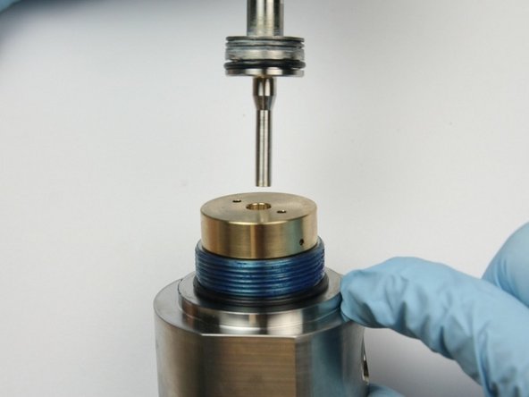 Pull the swivel shaft out of the back-up bearing.