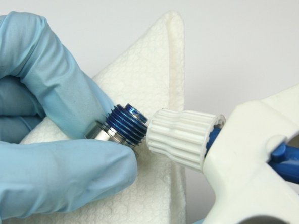 Clean the thrust nut of all Blue Goop with isopropyl alcohol.