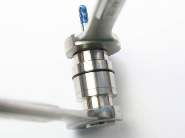 Use two 3/4&quot; wrenches to separate the bearing half and seal half of the swivel housing.