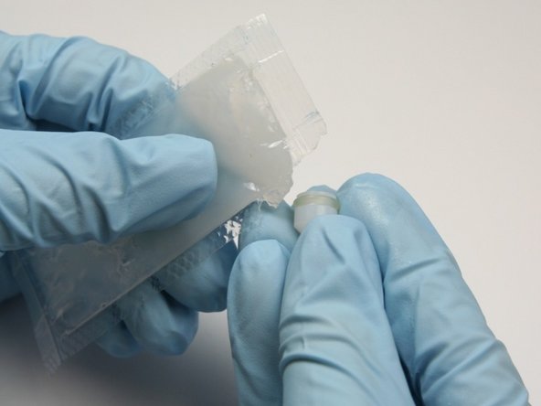 Apply a layer of high vacuum grease to the high-pressure seal.