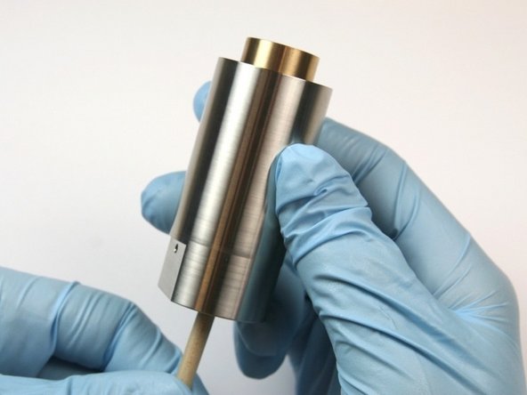 Push the piston out of the actuator housing through the oil port using the  included dowel.