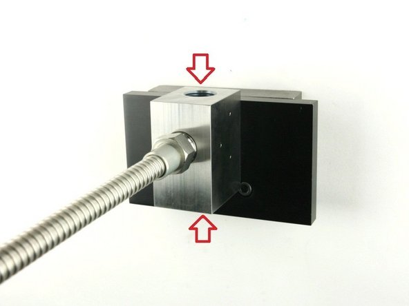 Visually inspect the top and bottom of the valve bore for cracks/blemishes. If excessive wear or cracks are visible, replace the valve body.