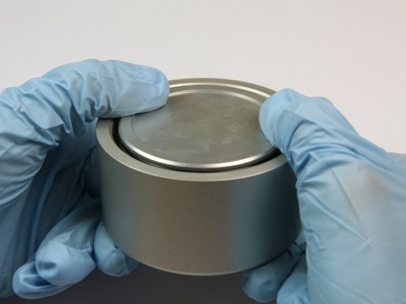 Push the piston into the actuator housing with the flat side of the piston up until it bottoms out.