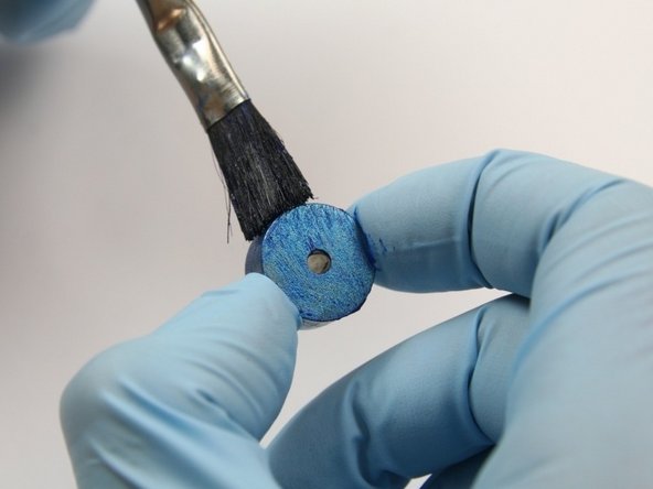 Apply Blue Goop to all surfaces of the insert.