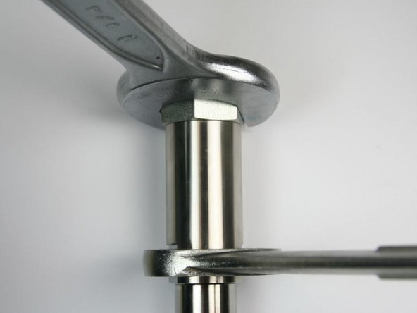 Loosen the adapter fitting from the actuator housing using 1-1/4&quot; and 1-1/16&quot; wrench.