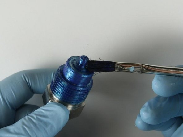 Apply Blue Goop to the top of the seat.