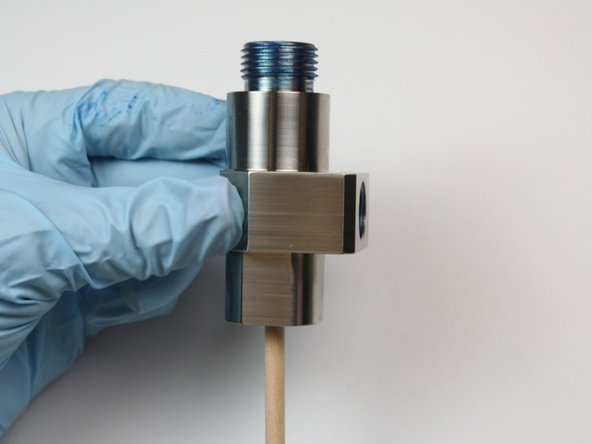 Push components through bleed down valve body with included dowel