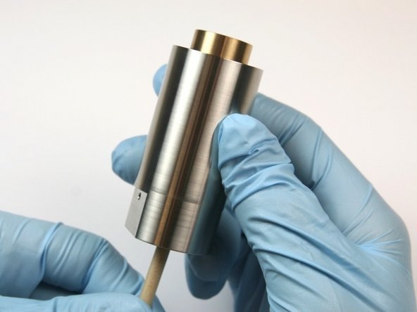 Push the piston out of the actuator housing through the oil port using the included dowel.