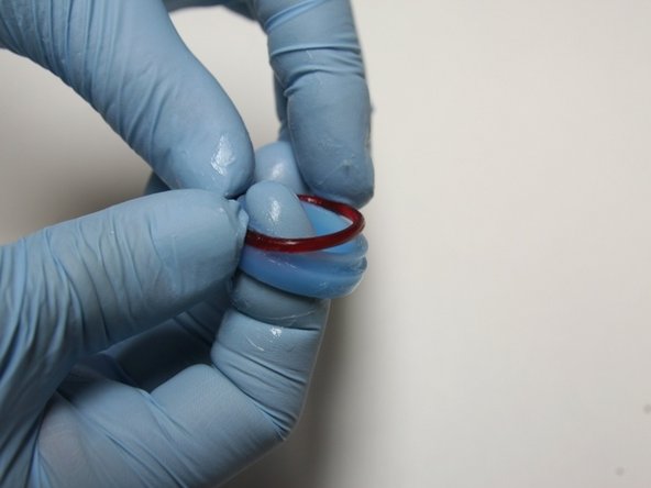 Put the O-ring on the seal.