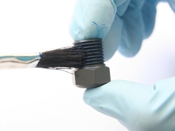 Apply Blue Goop to the high-pressure gland threads.