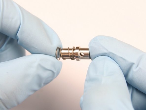 Apply Blue Goop to the outlet body threads.