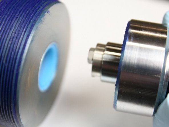 Proceed with the installation of the check valve body into the intensifier.