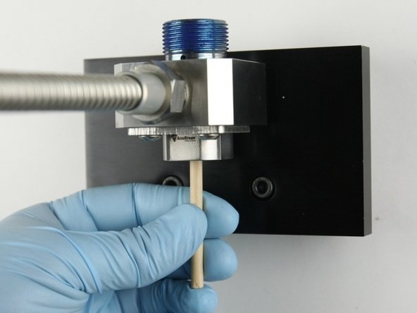 Remove all the valve components from the valve body using the included dowel.