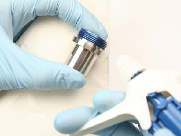 Clean the seal half of the swivel housing of all Blue Goop with isopropyl alcohol or a similar cleaning agent.