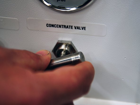 Keep the permeate water line to drain for this procedure.