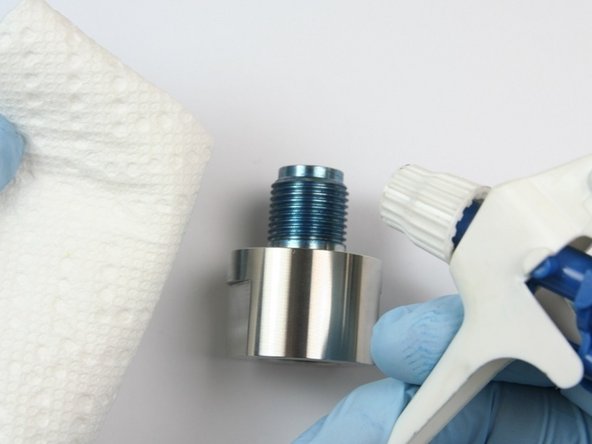 Clean the outlet body threads of all Blue Goop.