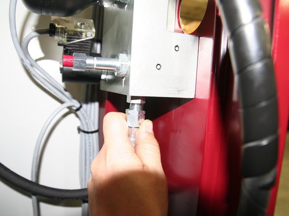 Connect hydraulic line from &quot;T&quot; fitting on hydraulic pump to port labeled PP on bottom of new manifold.