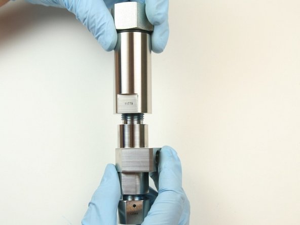 Thread valve body into housing