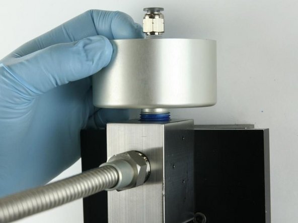 Thread (hand tighten) the actuator into the top of the valve body until it bottoms out.