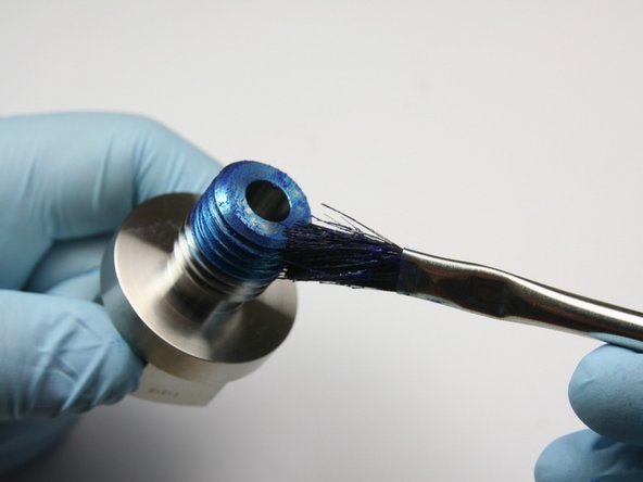 Apply blue goop to the high-pressure sealing head gland threads and the end.