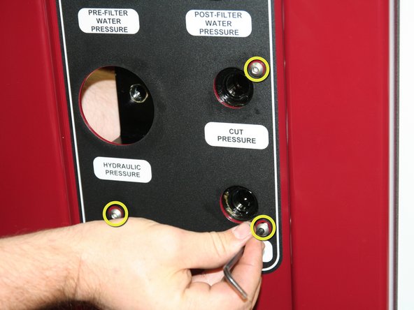 Remove old control manifold from pump frame.