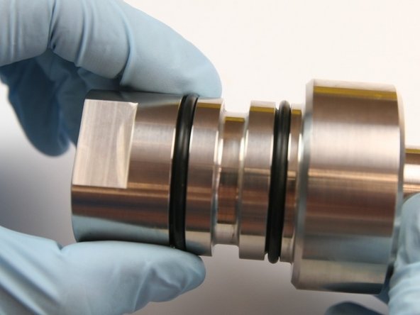 Slide the second O-ring to the outer groove of the check valve body.