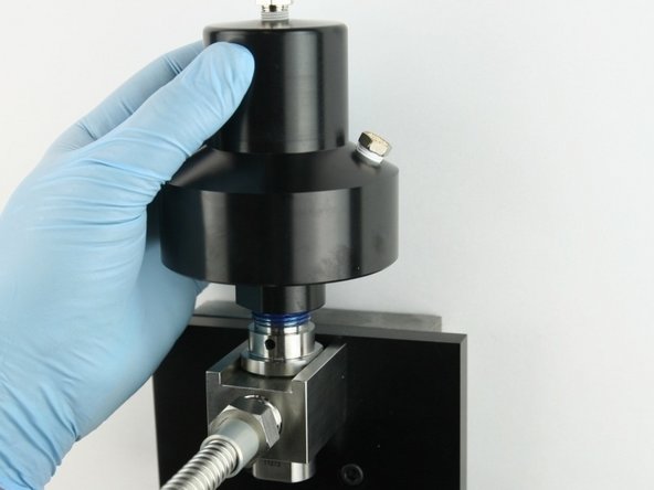 Thread (hand tighten) the actuator onto the top of the valve body.