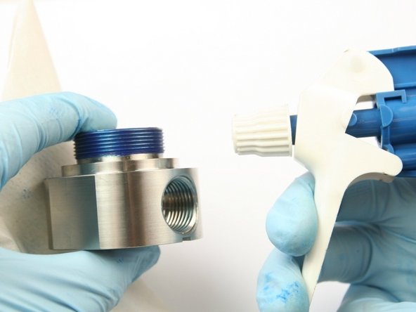 Clean the seal half of the swivel housing of all blue goop with isopropyl alcohol or a similar cleaning agent.