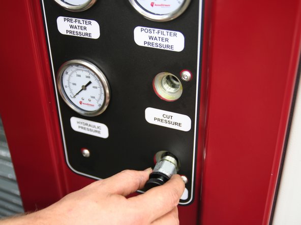 Install control knobs &quot;Cut&quot; and &quot;Pierce&quot; into respective ports on front of manifold.