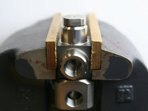 Put the parallel swivel into a vise.