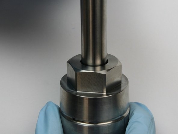 Using a .575&quot; gage pin, press the wiper down with an arbor press until the wiper bottoms out.