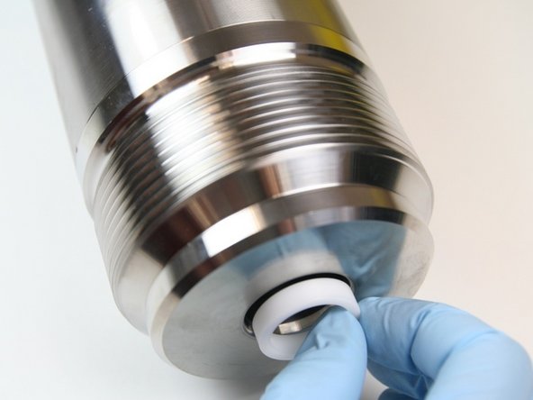 Put the dynamic seal back-up behind the high-pressure seal.