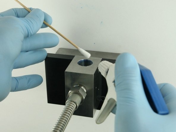 Thoroughly clean the interior of the valve body with isopropyl alcohol or a  similar cleaning agent before replacing the components.