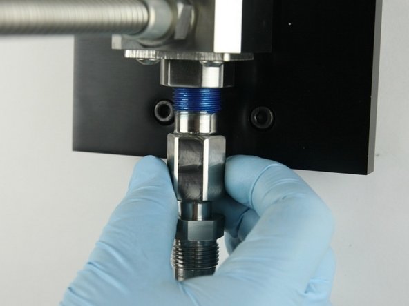 Thread the adapter into the valve body.