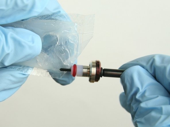 Apply the high-pressure lubricant to the outside diameter of the high-pressure valve seal.