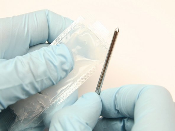 Apply ahigh vacuum grease to the needle.