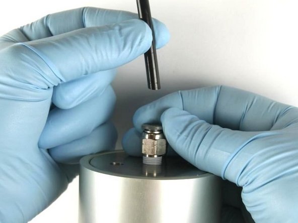 Disconnect the air line from the actuator.