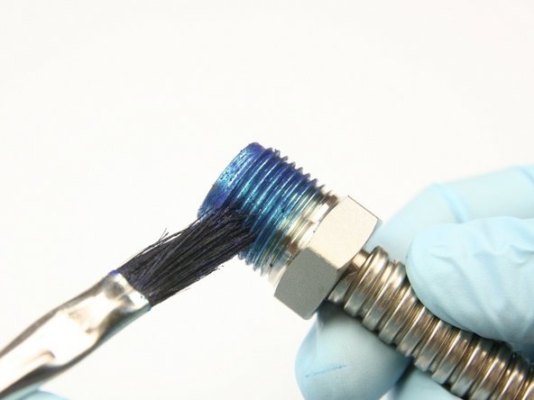 Apply blue goop to 3/8" gland nut threads